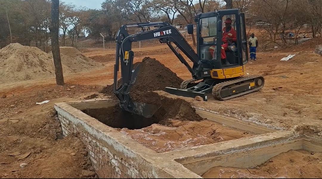 Huayee HY35C excavator loading spoil from a foundation dig