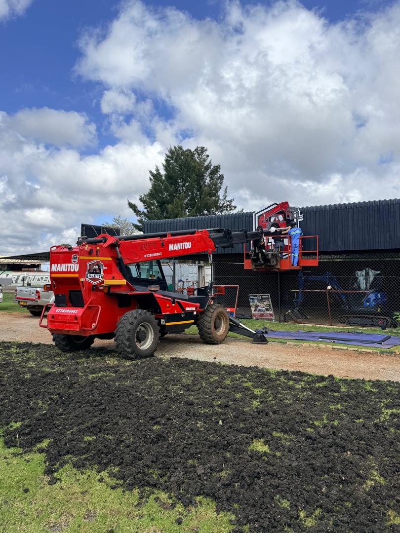 Baletta Manitou telehandler for hire in Harare with its boom raised