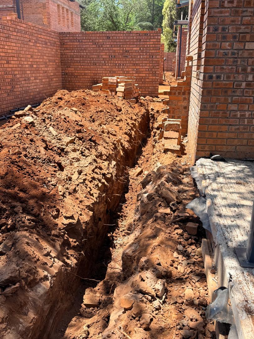 Foundation trench dug with a hired mini excavator in Harare
